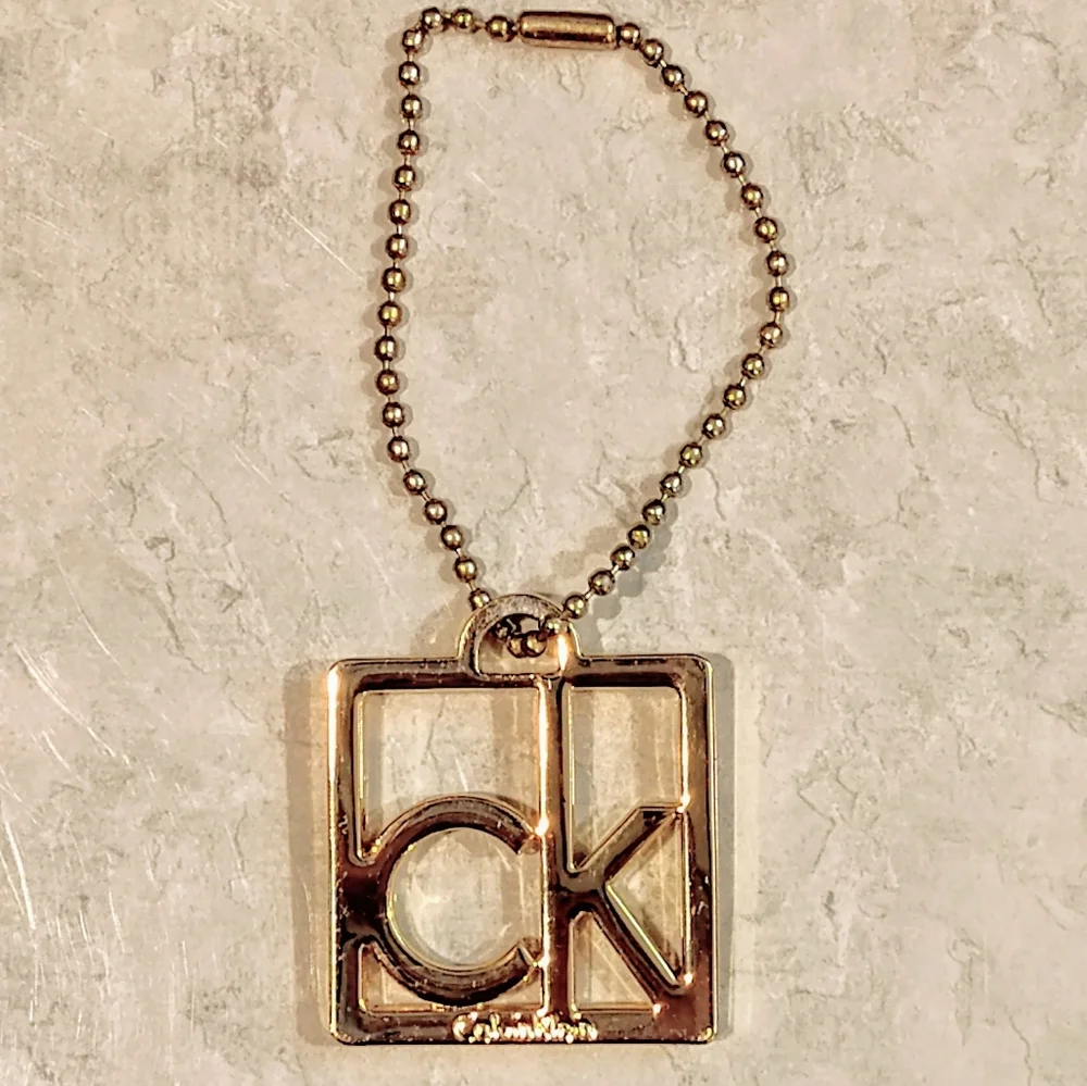 CALVIN KLEIN SQUARE CK LOGO GOLD TONE METAL BAG CHARM / KEYCHAIN. - Picture 2 of 6